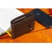Шкіряне чоловіче портмоне на кнопці ST Leather ST104 Коричневе Шкіряне чоловіче портмоне на кнопці ST Leather ST104 Коричневе
