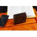 Коричневе чоловіче портмоне з натуральної шкіри з фіксацією ST Leather ST103 Коричневе чоловіче портмоне з натуральної шкіри з фіксацією ST Leather ST103