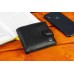 Шкіряне чоловіче портмоне на кнопці ST Leather ST-104-1 чорний Шкіряне чоловіче портмоне на кнопці ST Leather ST-104-1 чорний
